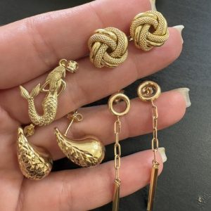 3 pares aretes y 1 dije 10kt